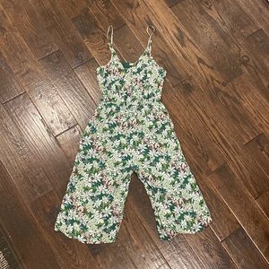 Womens green floral capri length jumper. Cinched at waist, adjustable straps.